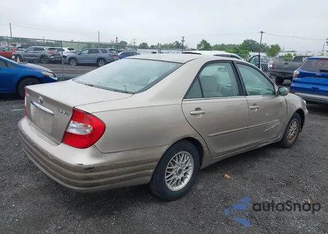 2003 Toyota Camry Le z USA, uszkodzony, nr VIN 4T1BE32K63U127628